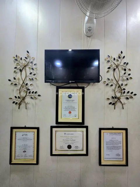 Certificates displayed at Genus Dental